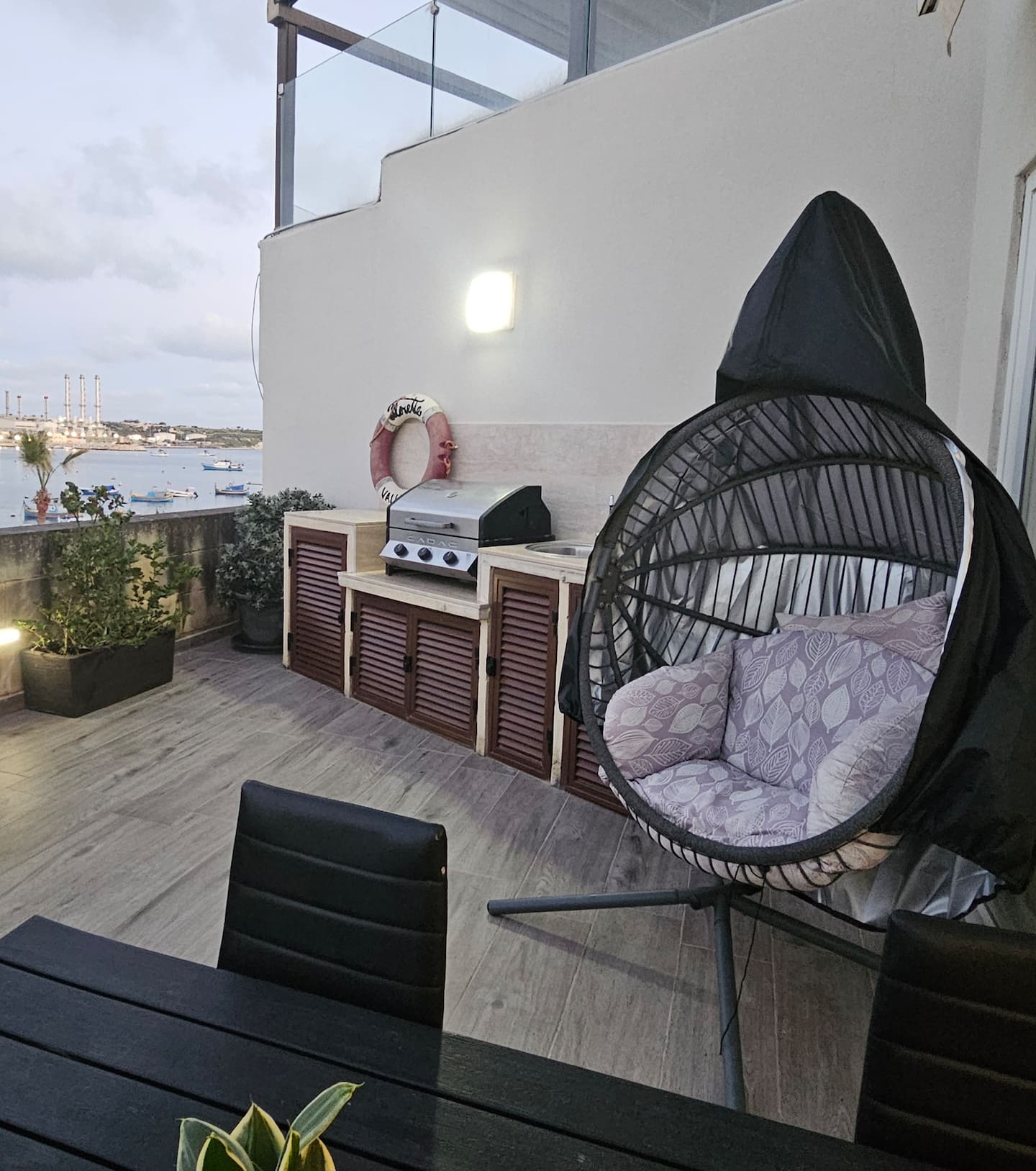 Built-in BBQ grill on the penthouse terrace overlooking Marsaxlokk Bay