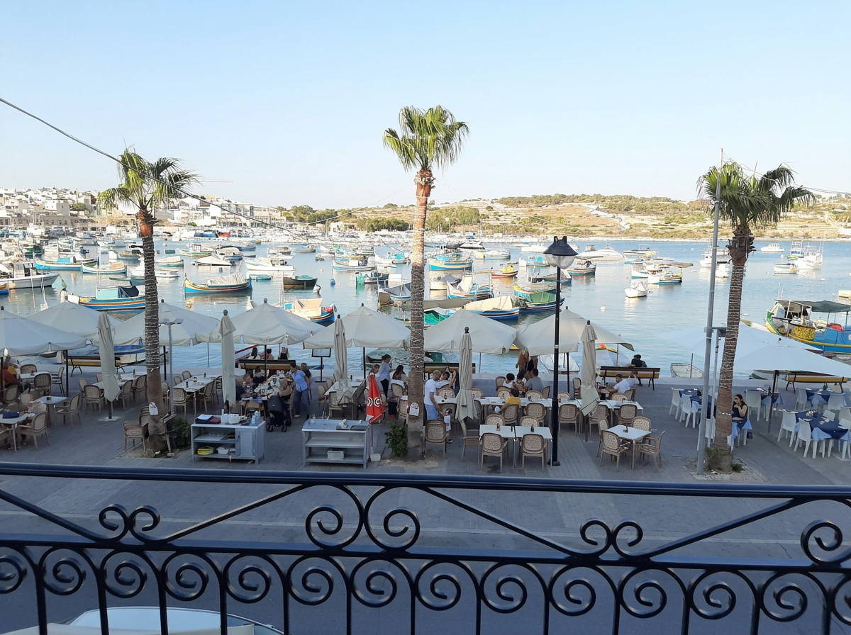 Balcony over Marsaxlokk harbour at the Mr Fitz Apartment Harbour View